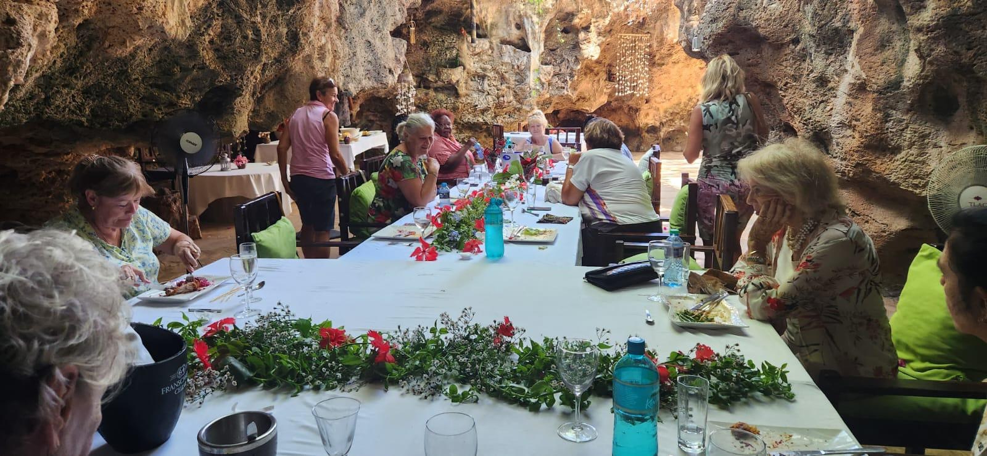 A long table set in the cave