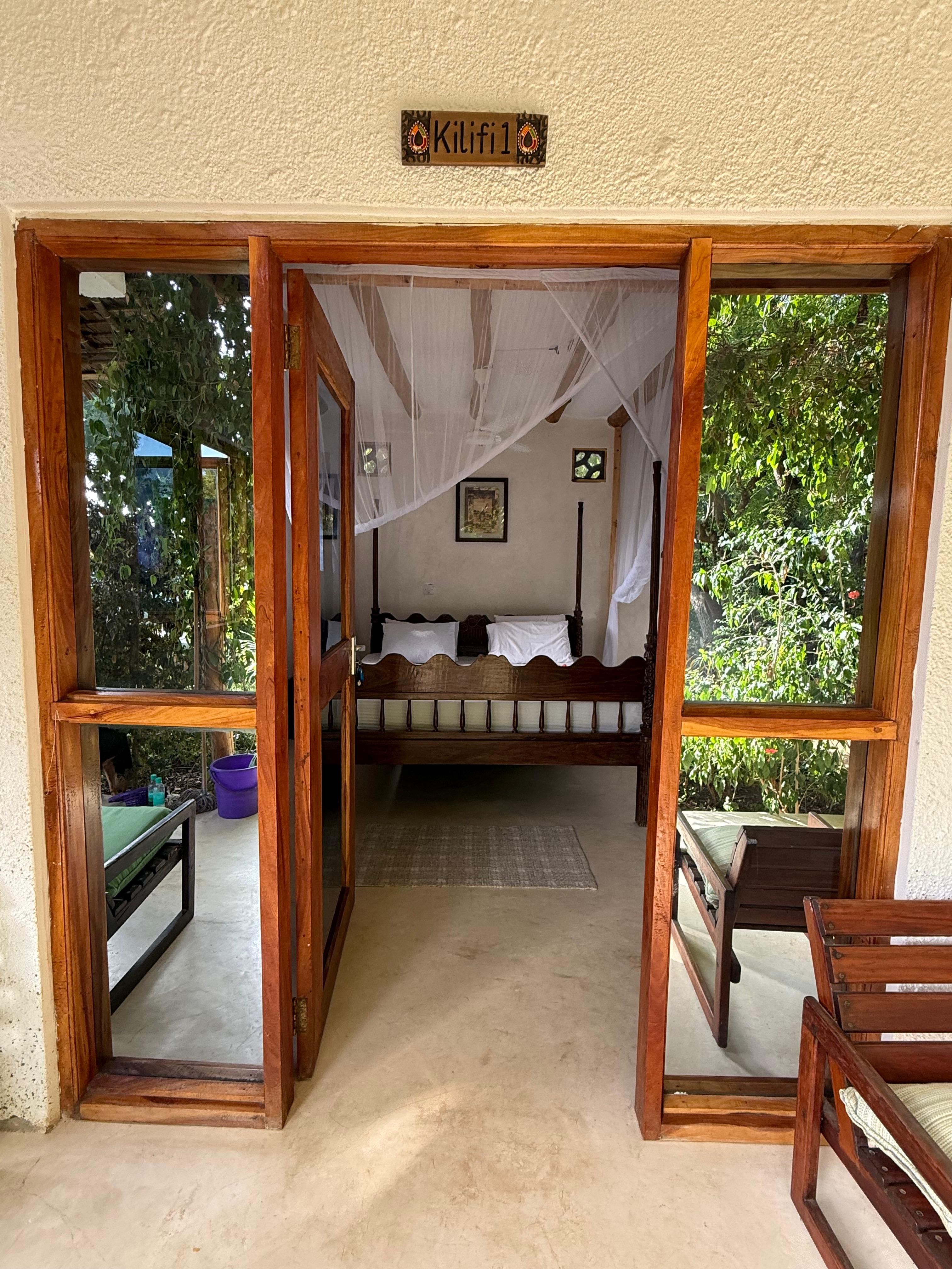 Kilifi Cottage, with its own veranda and signage