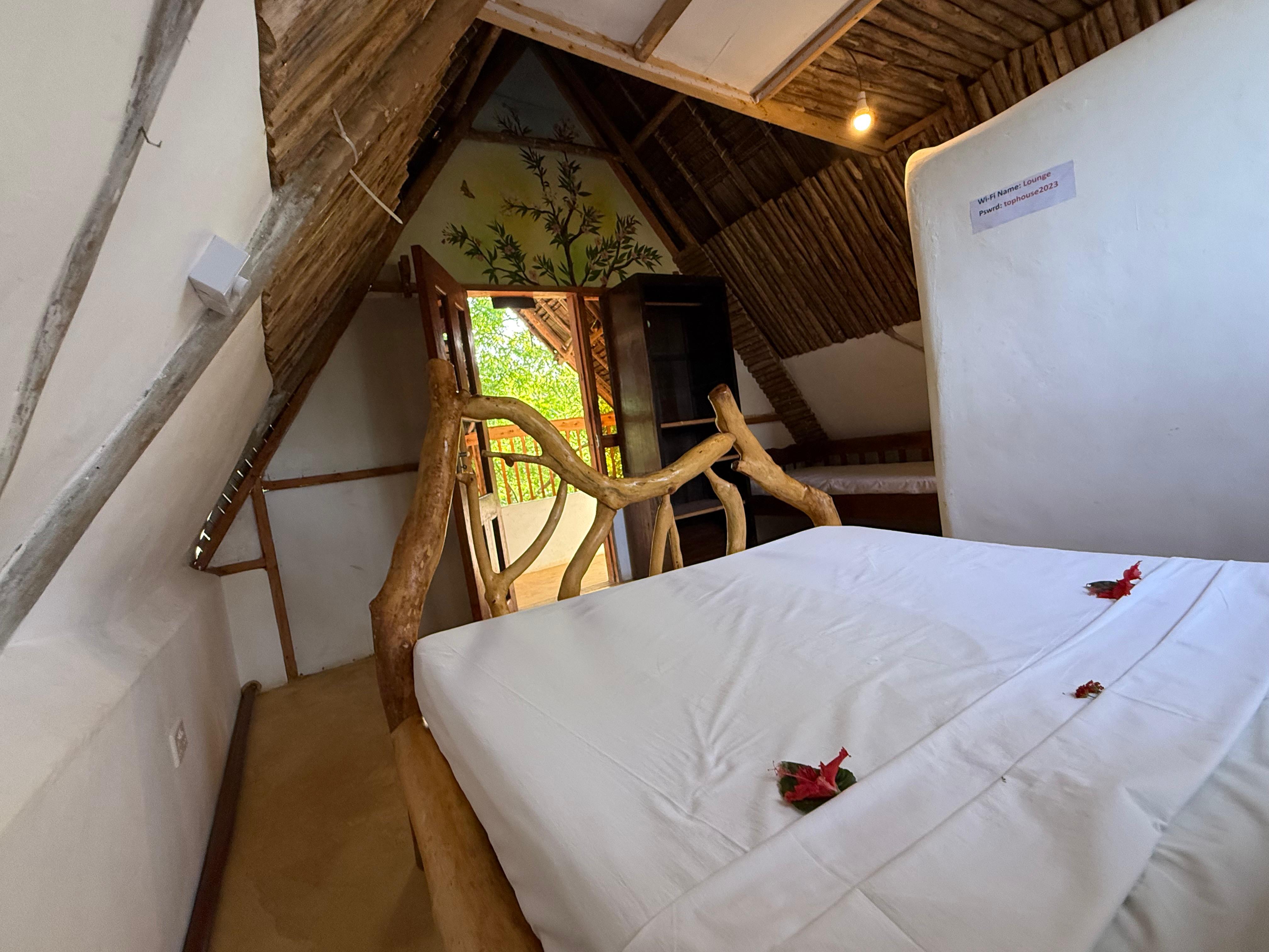 The Loft, with its carved branch bed
