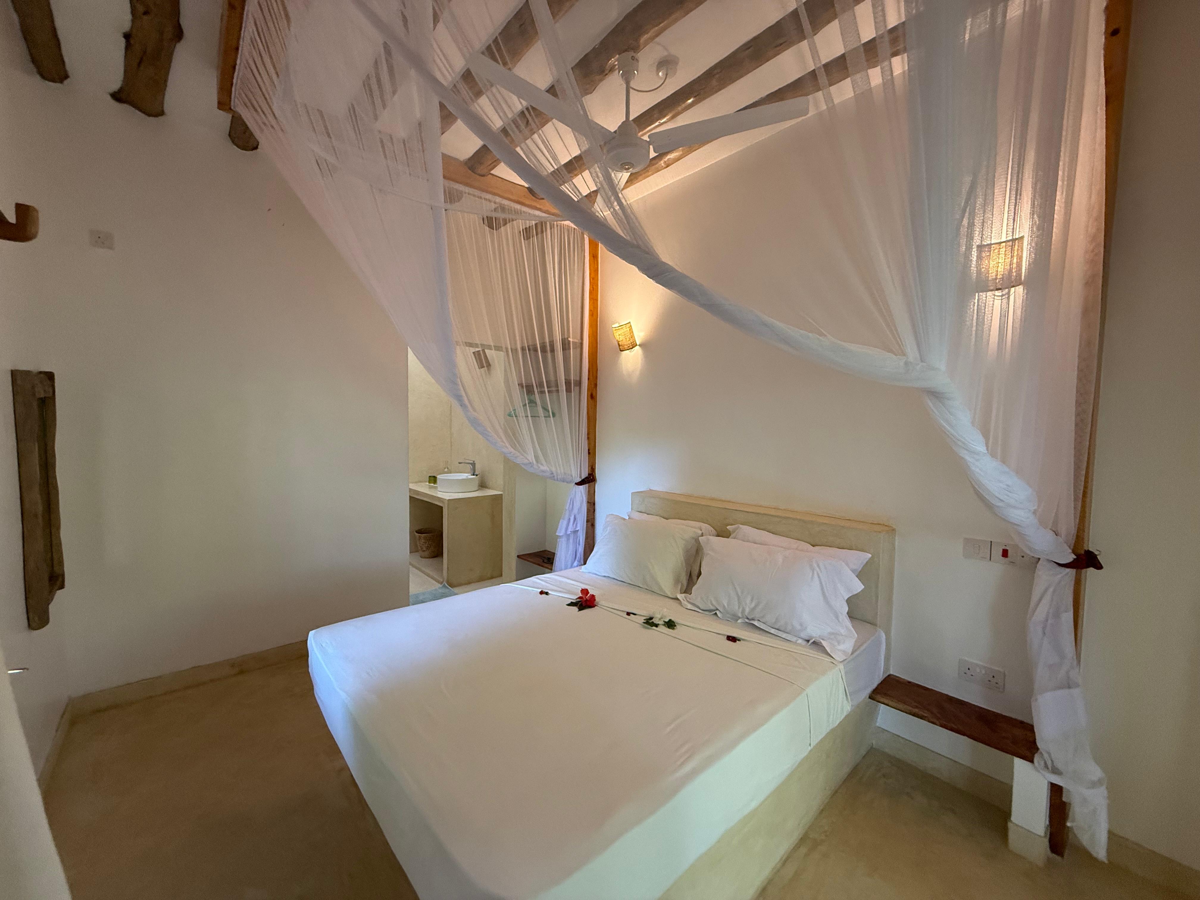 The Linen Suite, with mosquito net canopy